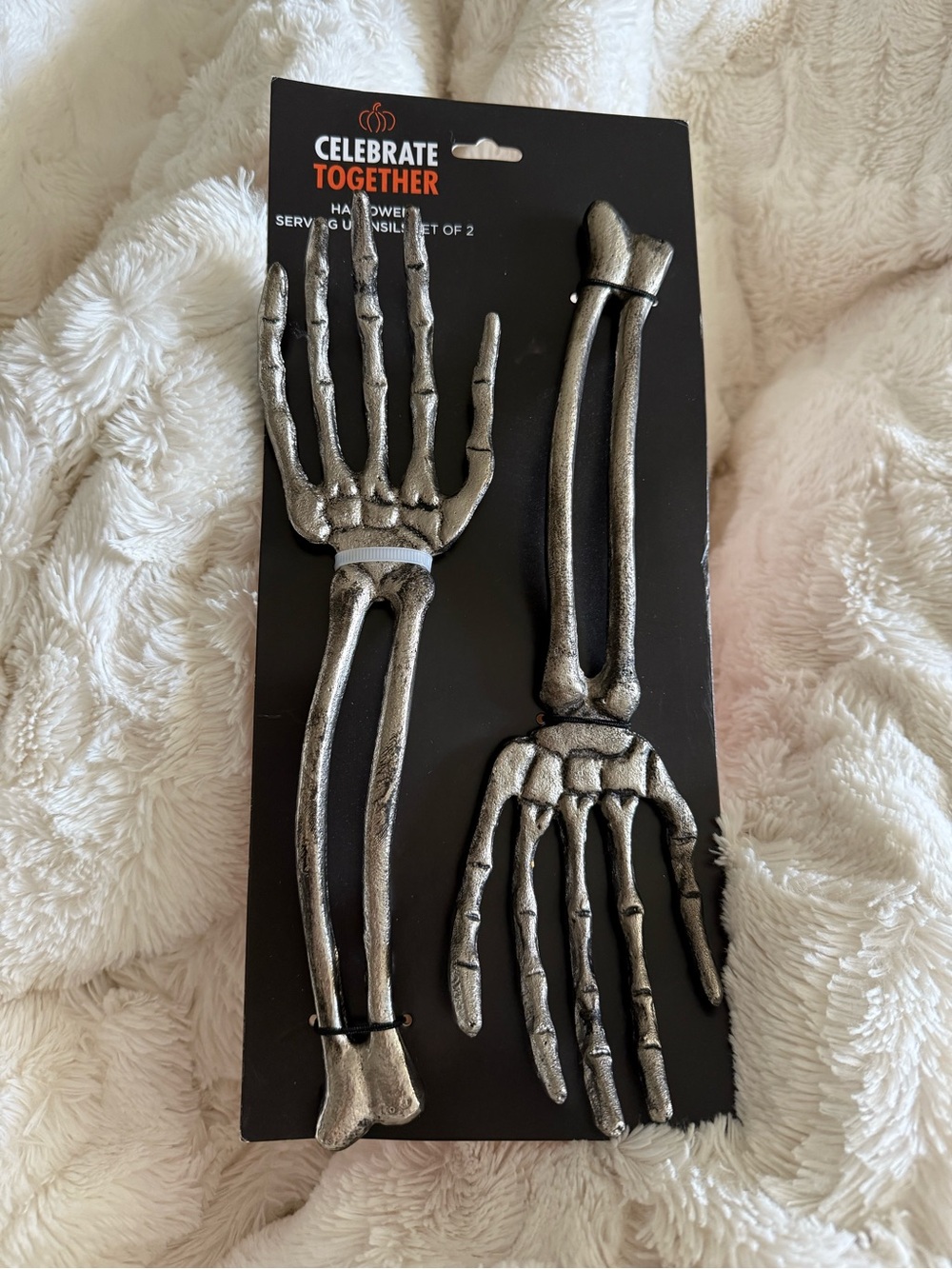Silver/Pewter 2pc skeleton arms serving utensils. Make your Halloween food scary